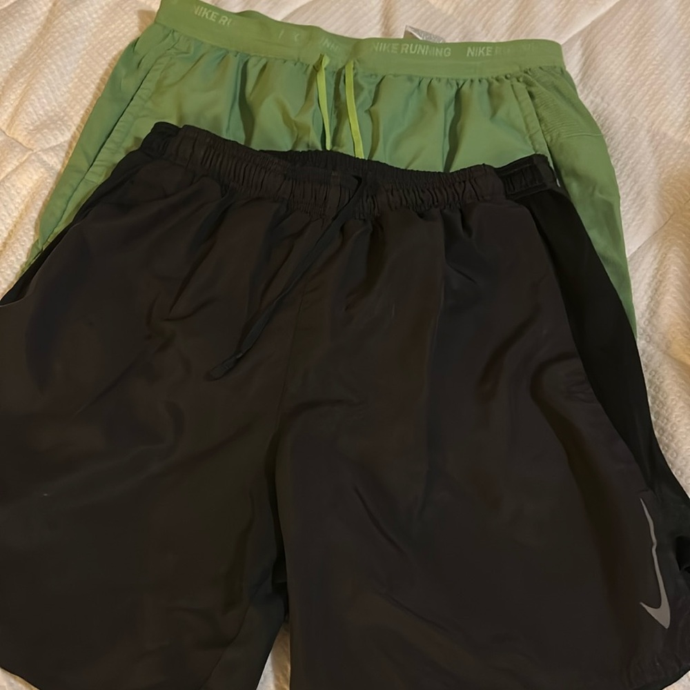Two pair men’s Nike athletic shorts.
